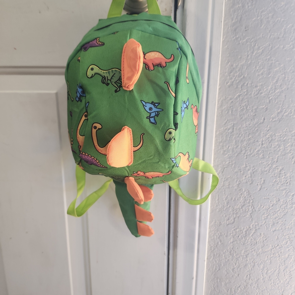 NWOT Never Used Green and Orange Dinosaur Backpack